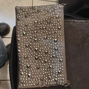 Metallic silver with studs clutch